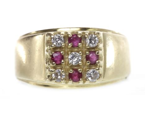 EIGHTEEN CARAT GOLD RUBY AND DIAMOND RING
with a square bezel 9mm wide and set with round rubies and diamonds, size L, 8.9g