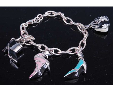 A modern silver charm bracelet, set with four enamel and paste set charms
