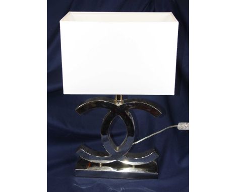 A modern plated metal table lamp with shade, h.58cm