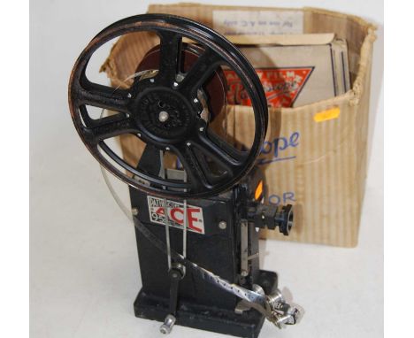 A Pathescope Ace projector, in original box, with Pathescope Safety Films etc