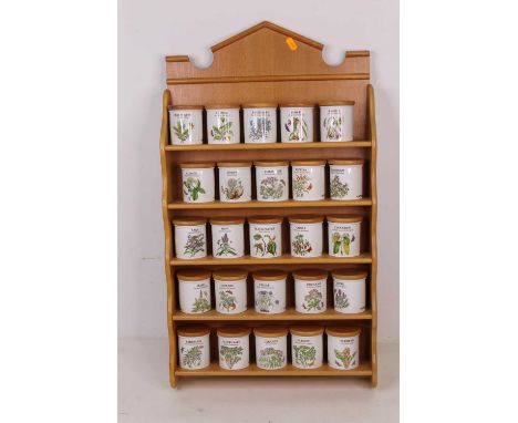 A collection of Portmeirion Garden pattern herbs 7 spice jars, and spice rackCondition report: 25 jars, each h.7cm.Rack 74 x 
