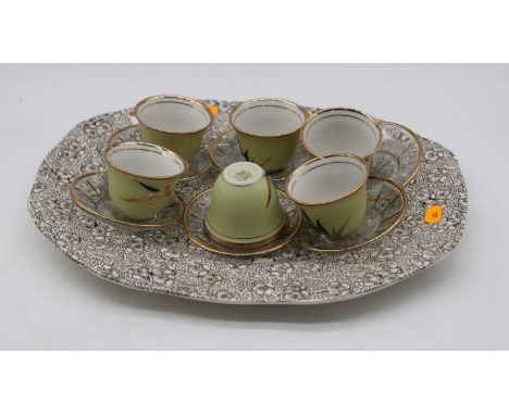 A 20th century Japanese six place tea service, together with a transfer decorated meat dish