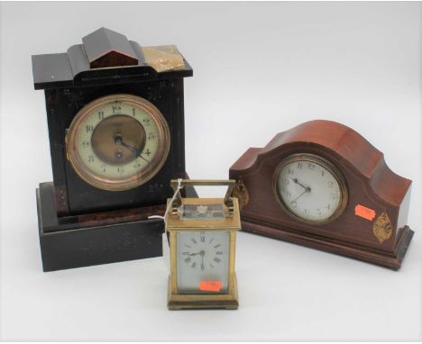 A Victorian black slate mantel clock, height 27cm; together with an early 20th century mahogany cased mantel clock and a 20th