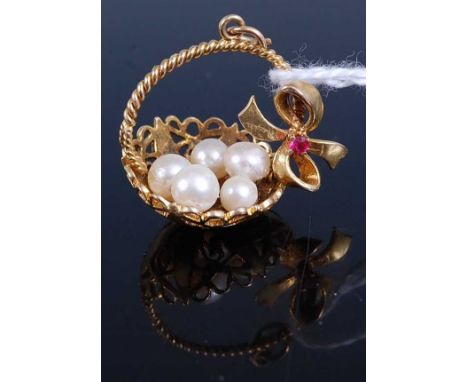 A 9ct gold pendant set with five cultured pearls and a small synthetic ruby, gross weight 5.3g