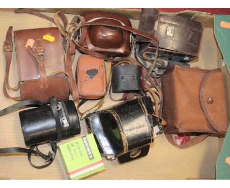 A box of various vintage camera equipment to include a Topcon RE2 camera (cased)