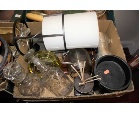 A box containing a collection of miscellaneous items to include a modern table lamp, cut glass decanters, etc