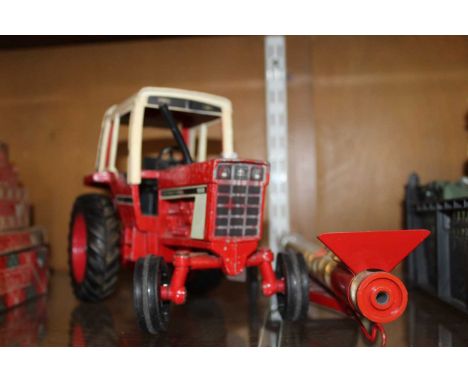 A diecast model of an international 1086 tractor