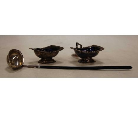 A Silver Hallmarked toddy ladle inserted with a George III silver sixpence. Together with two silver plated open salts, each 