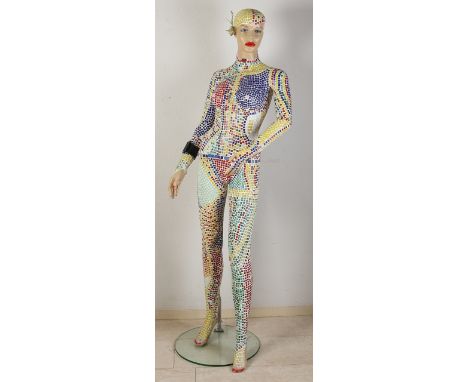 Life size modern art mannequin.&nbsp;Glued with hundreds of small ceramic tiles and decorated with jewellery.&nbsp;Art Nouvea