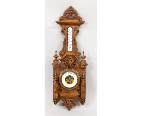 Antique oak Dutch barometer.&nbsp;Circa 1890. Historicism with lion head.&nbsp;Circa 1890. Size: 69 cm.&nbsp;In good conditio