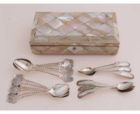 Mother of pearl spoon box with 18 silver spoons, 833/000.&nbsp;Rectangular box with mother-of-pearl mosaic, pieces are missin