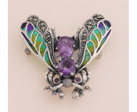 Silver brooch/pendant, 925/000, in the shape of a fly with amethysts, marquesite and enamel.&nbsp;35x38mm.&nbsp;about 9.4 gra