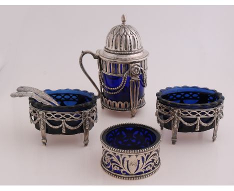 Silver spices set with blue glass.&nbsp;Two antique spice bowl oval model with garlands, ram's heads and oval sawn edge.&nbsp