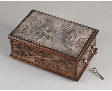 Frisian carved wooden box with silver plaque, handles and 4 ball feet.&nbsp;Rectangular lockable chest decorated with Frisian