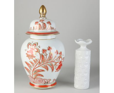 Two German porcelain vases.&nbsp;1x White Meissen vase.&nbsp;1x Heubach lidded vase.&nbsp;Floral/gold decor.&nbsp;Dimensions: