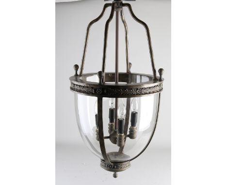 Large brass patinated lantern-shaped four-light pendant lamp in Louis Seize style.&nbsp;21st century.&nbsp;Dimensions: 78 x Ø