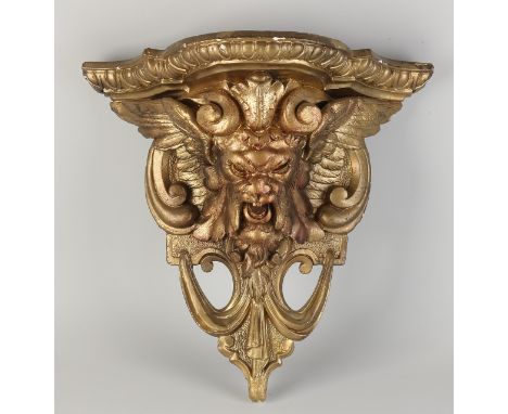 Antique gilded plaster wall console with fratz.&nbsp;Circa 1880. Historicism.&nbsp;Dimensions: 32 x 30 x 16 cm.&nbsp;In good 