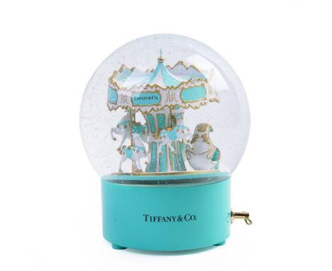 TIFFANY & CO.Rare Carousel Music Box / Snow-globeLimited EditionIn original Tiffany & Co caseDimensions: 17,5 x 15 cm / Case: