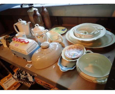 Shelf of mixed ceramics 