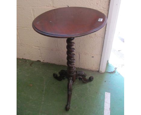 A mahogany pillar and tripod table