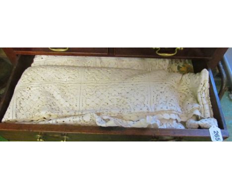 A pair of vintage lace bedspreads