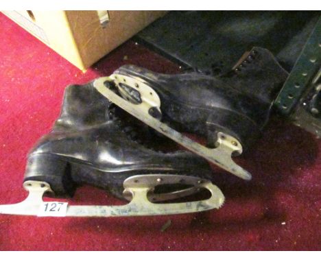 A pair of vintage MK gents ice skates