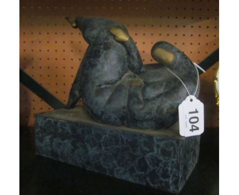 A modern abstract bronze nude figure