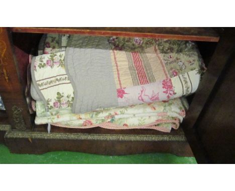 A Vintage French rose design quilt (watermarked) and a similar floral quilt (some staining)