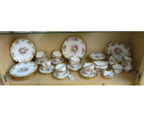 A Hammersley (part of the Spode group) part tea/dinner service:- twelve cups, another cup no handle thirteen saucers, twelve 