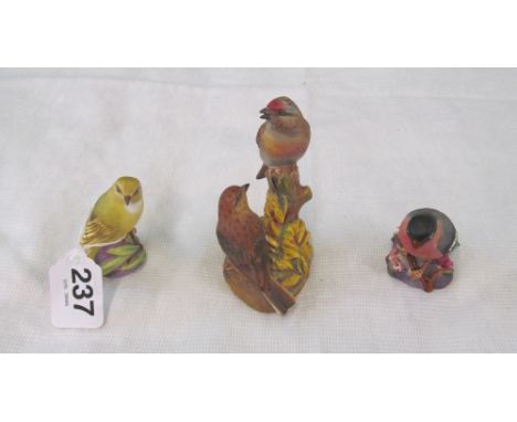 A Royal Worcester bird group two Linnets, a Bullfinch and a Wood Warbler
