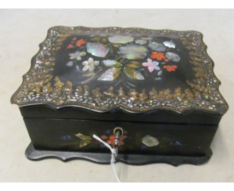 A Victorian papier mache shaped edge box inset mother of pearl and painted flowers (slightly a/f)