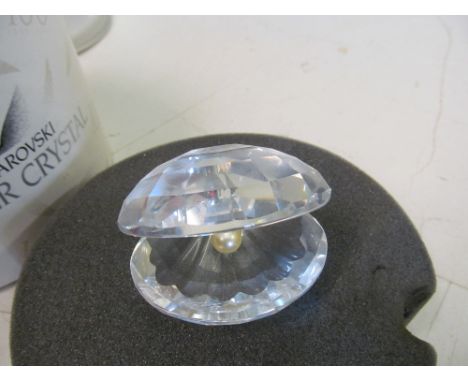 A Swarovski shell with pearl