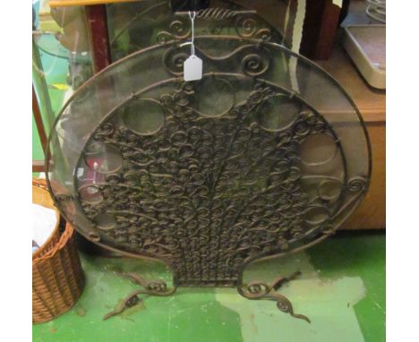 An ornate metal fireguard