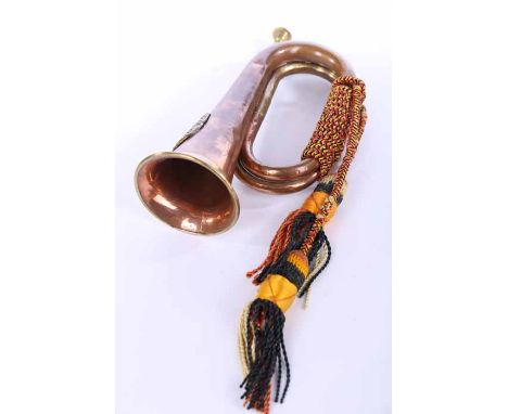 WWI COPPER AND BRASS ARGYLL AND SUTHERLAND REGIMENTAL BUGLE
with applied brass plaque, yellow, blue and red cord and tassels,