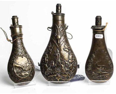 VICTORIAN COPPER POWDER FLASK
with embossed stag's head motif above cartouche depicting huntsman and hounds, contained within