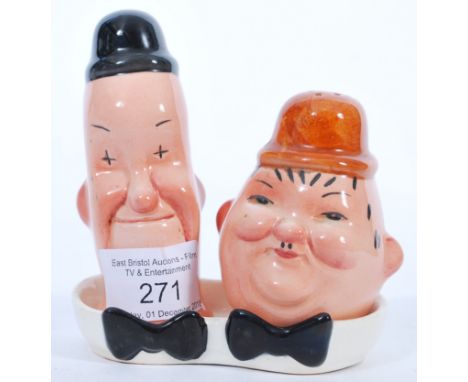 A charming vintage Beswick made Laurel &amp; Hardy condiment salt &amp; pepper set. Beswick stamps to base. Both complete, an