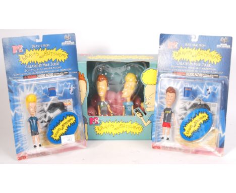 A collection of vintage 1990's Beavis &amp; Butt-head action figures. To include; 2x Moore Action Collectibles carded figures