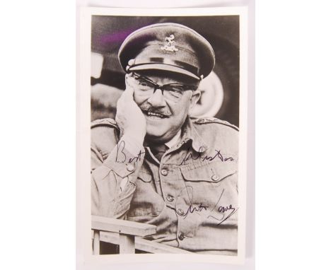 Arthur Lowe - (1915-1982) Actor and Writer. A vintage hand signed autographed postcard sized photo of Lowe in character as Ca