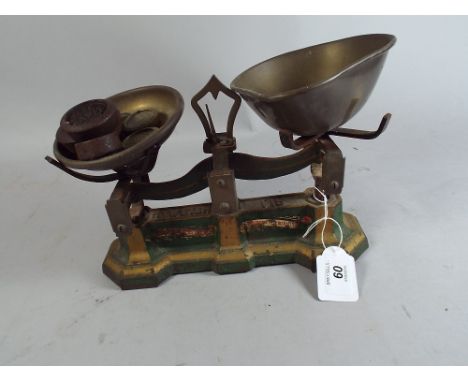 A Set of Vintage Kitchen Scales with Weights. 