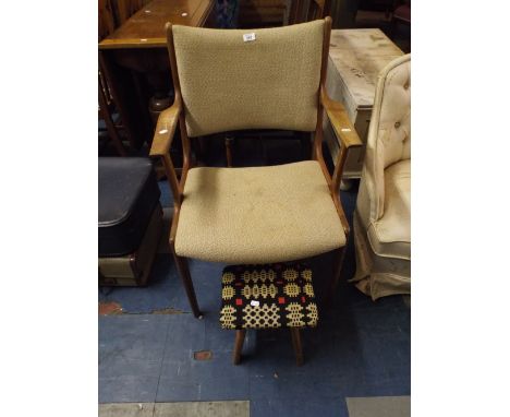 A 1970's Teak Arm Chair and Stool.