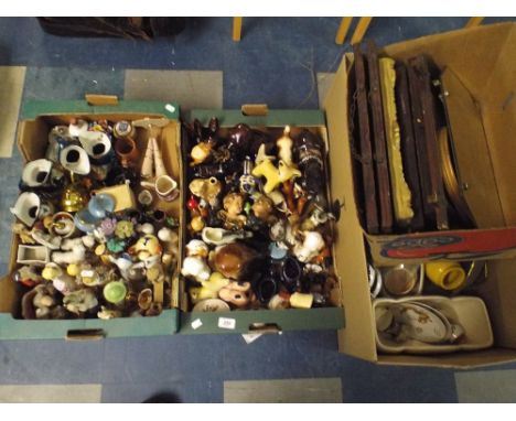 Four Boxes Containing Various Items Ceramics Figural Ornaments Character Jugs Pictures and Prints Glass China Etc. 