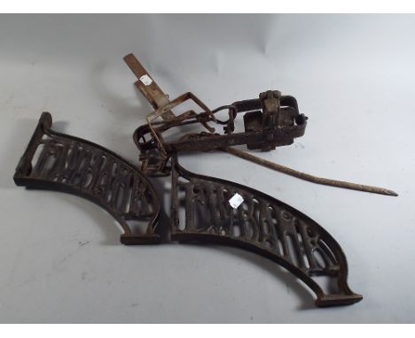 A Mole Trap, A Gin Trap and Two Ewbank Cast Metal Shelf Brackets. 