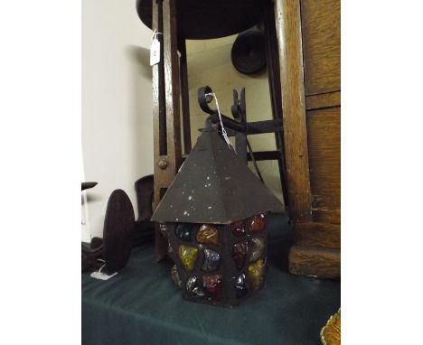 A Metal Wall Mounting Lantern with Colour Glass Shade.