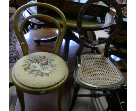 A 19th Century child's can seated chair with black japaned finish frame together with a further 20th Century bentwood child's