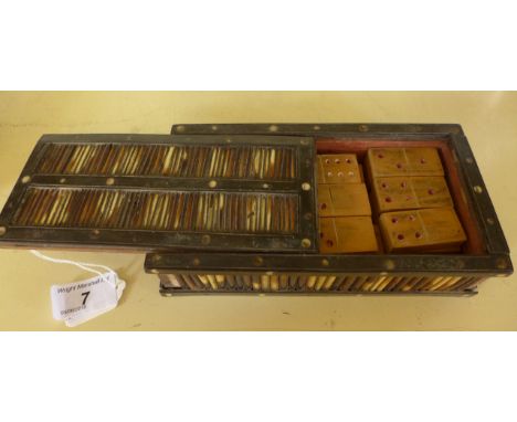 A 19th Century porcupine quill box, containing wooden dominoes, length of box 18cm