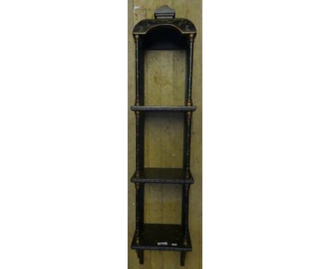 A small 20th Century dark painted narrow three tier wall shelf with pagoda type top and painted detail.