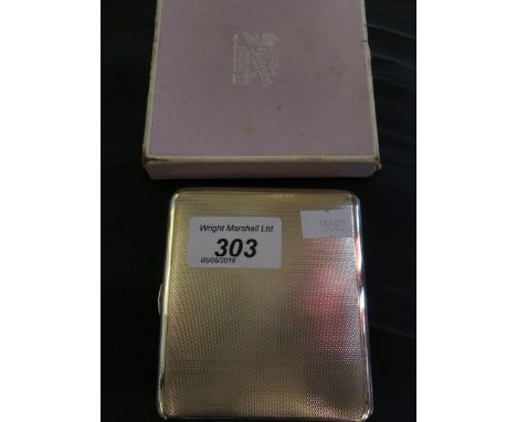 A silver cigarette case, with engine turned decoration