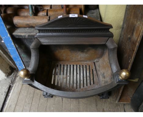 A cast iron fire grate