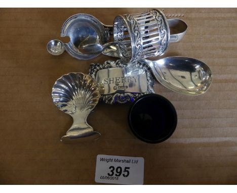 A mixed lot of assorted silver wares to include a contemporary Sheffield hallmarked sherry decanter label, a Sheffield hallma