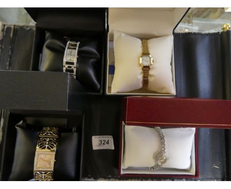 Two ladies Rotary wristwatches, together with, two Guess wristwatches, boxed (4)